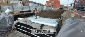 bassin d'infiltration sous l'entrée dans supermarché LIDL